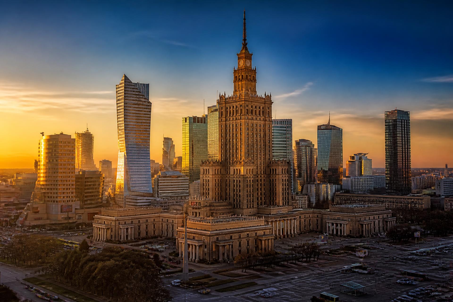 Warsaw skyline at sunset featuring the Palace of Culture and Science